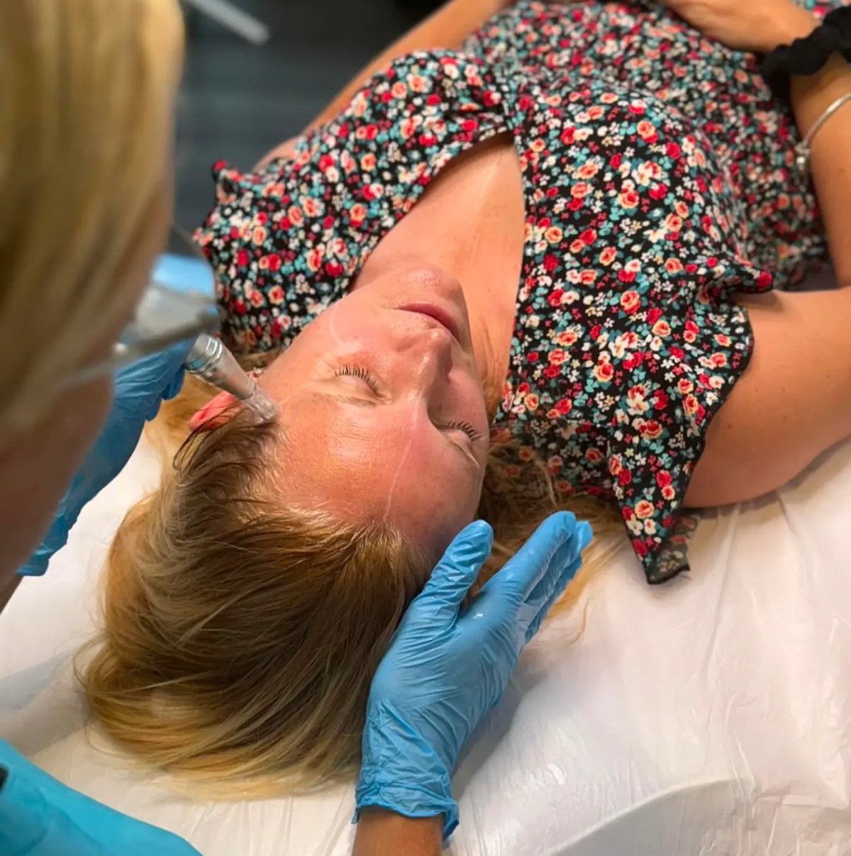 Cryo globe facial under LED light therapy